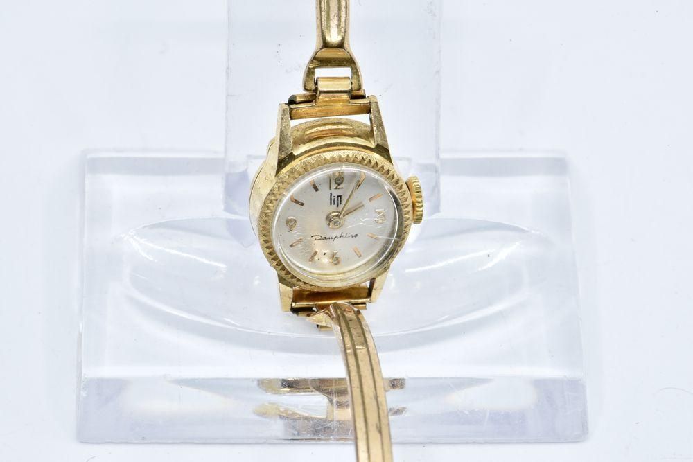 Null 
Lip

Ladies' wristwatch, round case.

Eagle hallmark on the case.

18K yel&hellip;