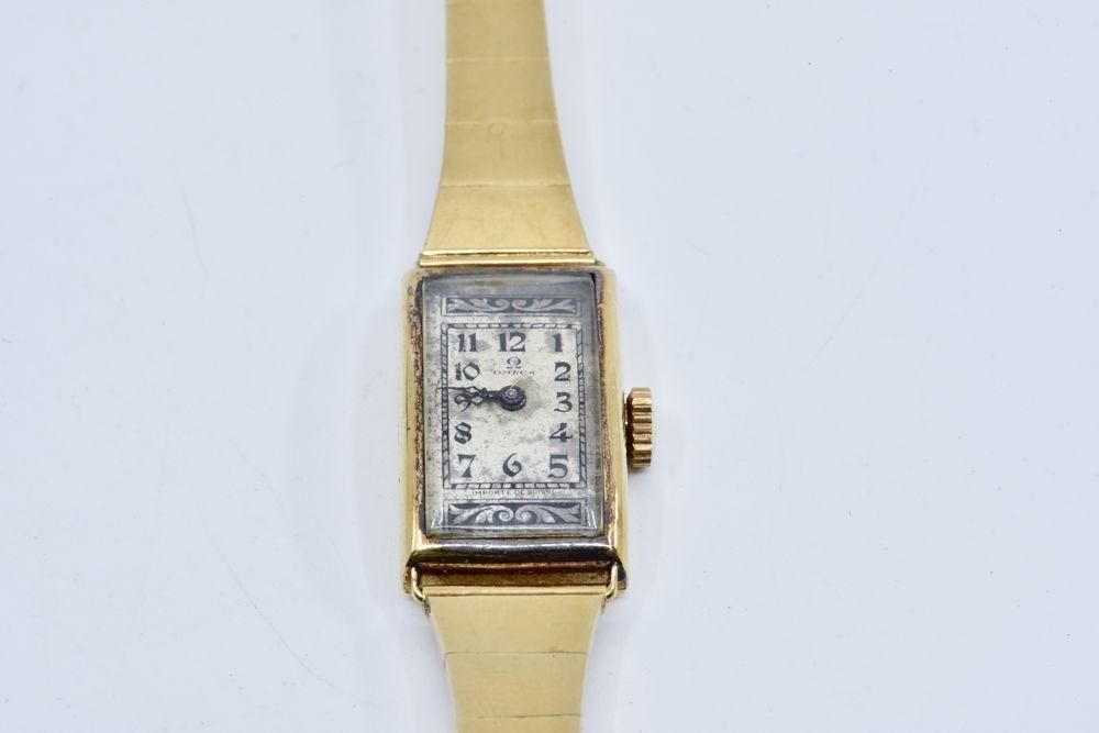 Null 
	Omega

Ladies' wristwatch, rectangular case, dial with Arabic numerals.

&hellip;