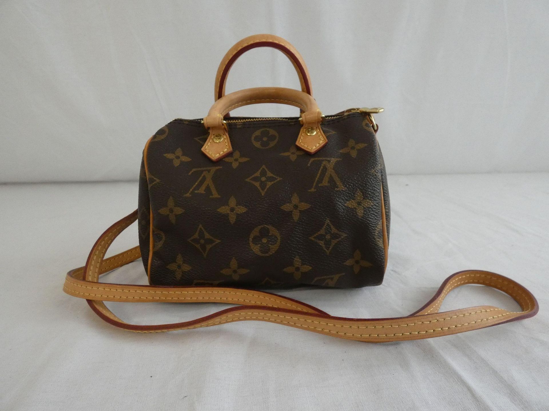 Null 
	Louis VUITTON year 2016

Bag 'Mini Speedy' 16cm in Monogram canvas and na&hellip;