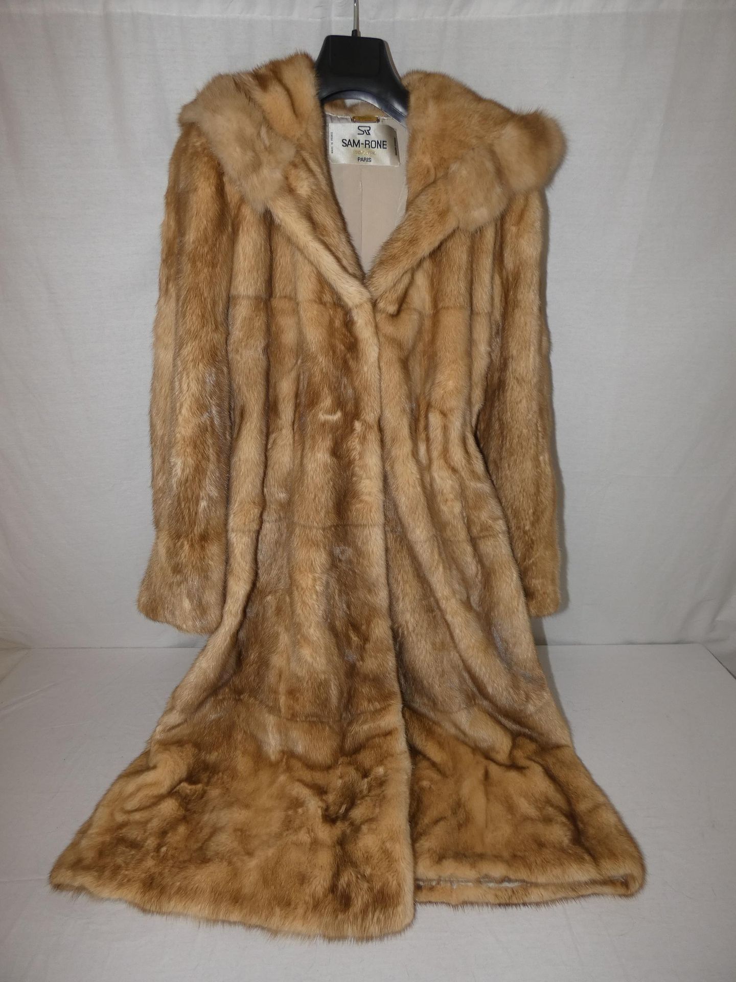 Null 
	Sam RONE

Long coat in golden mink, double fur hood trimmed with tone-on-&hellip;
