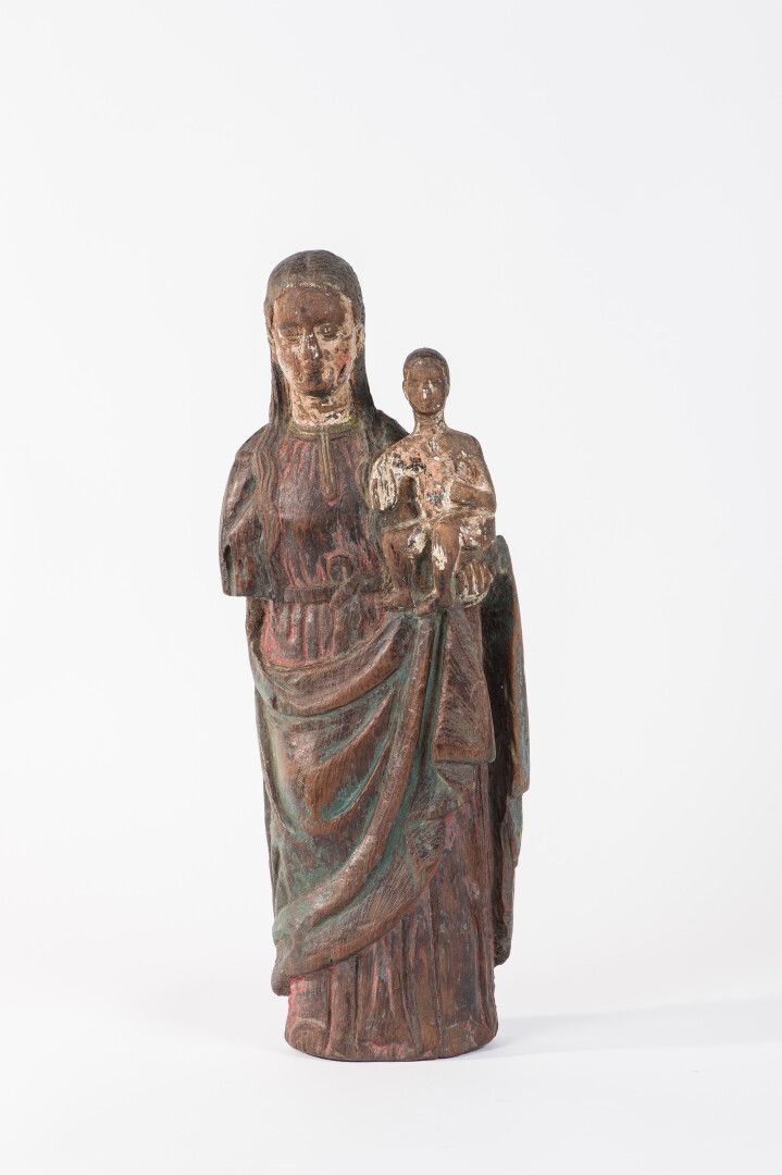 Null 雕刻和多色木制的圣母和儿童。

16/17世纪

高度：41厘米

(事故和丢失的零件)



专家 : Laurence Fligny女士