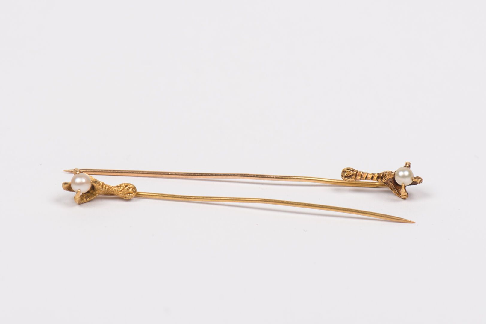 Null Pair of tie-pins in yellow gold 750 thousandths decorated with bird's talon&hellip;