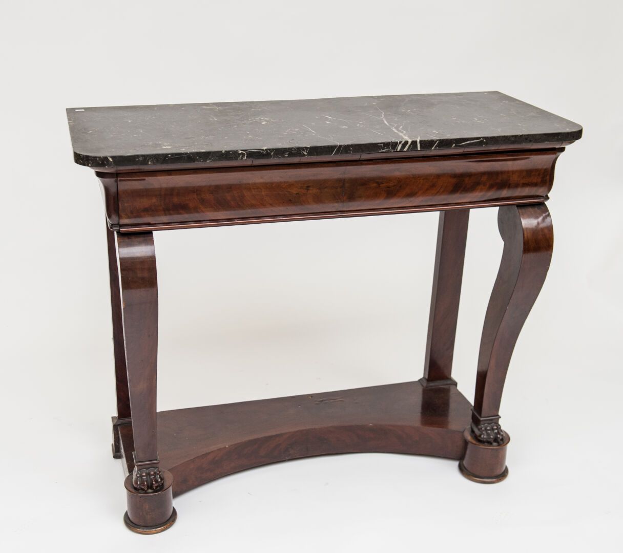 Null Mahogany and mahogany veneer console, opening to a drawer in the belt, the &hellip;