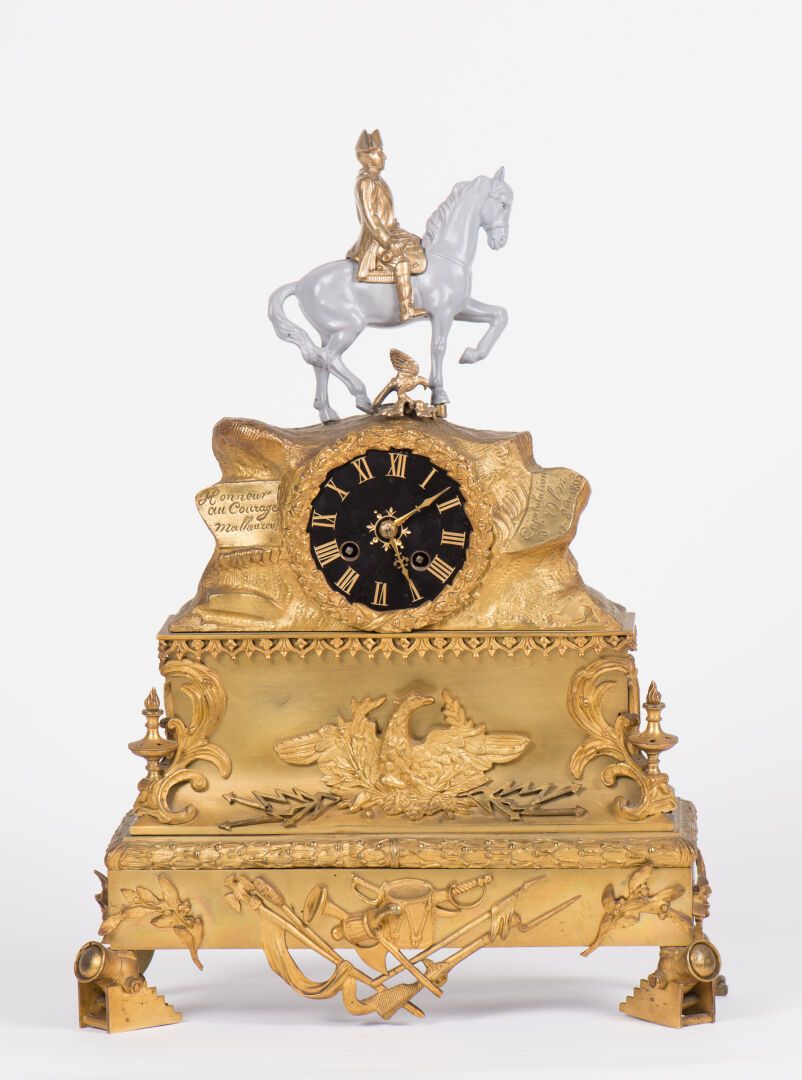 Null Gilt bronze clock on the Napoleonic theme, the dial with Arabic numerals to&hellip;