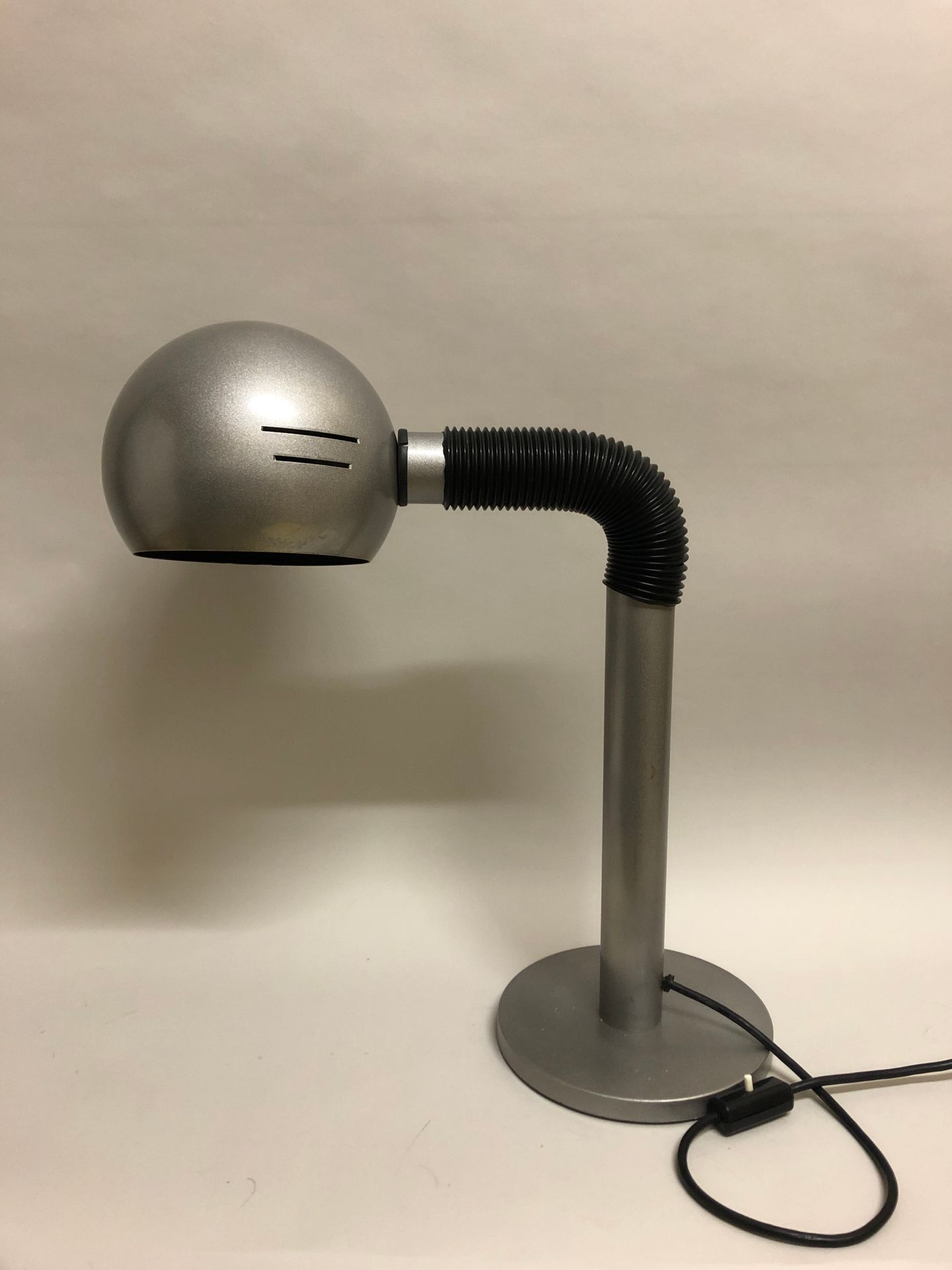 Null Desk lamp in grey metal and black plastic, bent arm. Height : 56 cm. Damage&hellip;