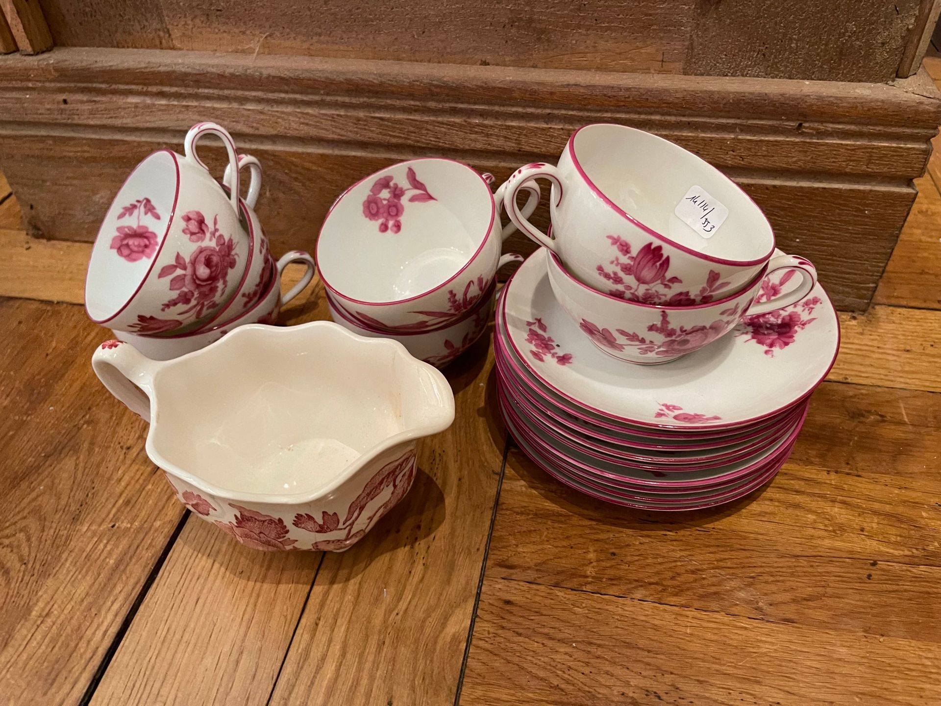 Null Parts of tea-coffee sets with pink flowers.