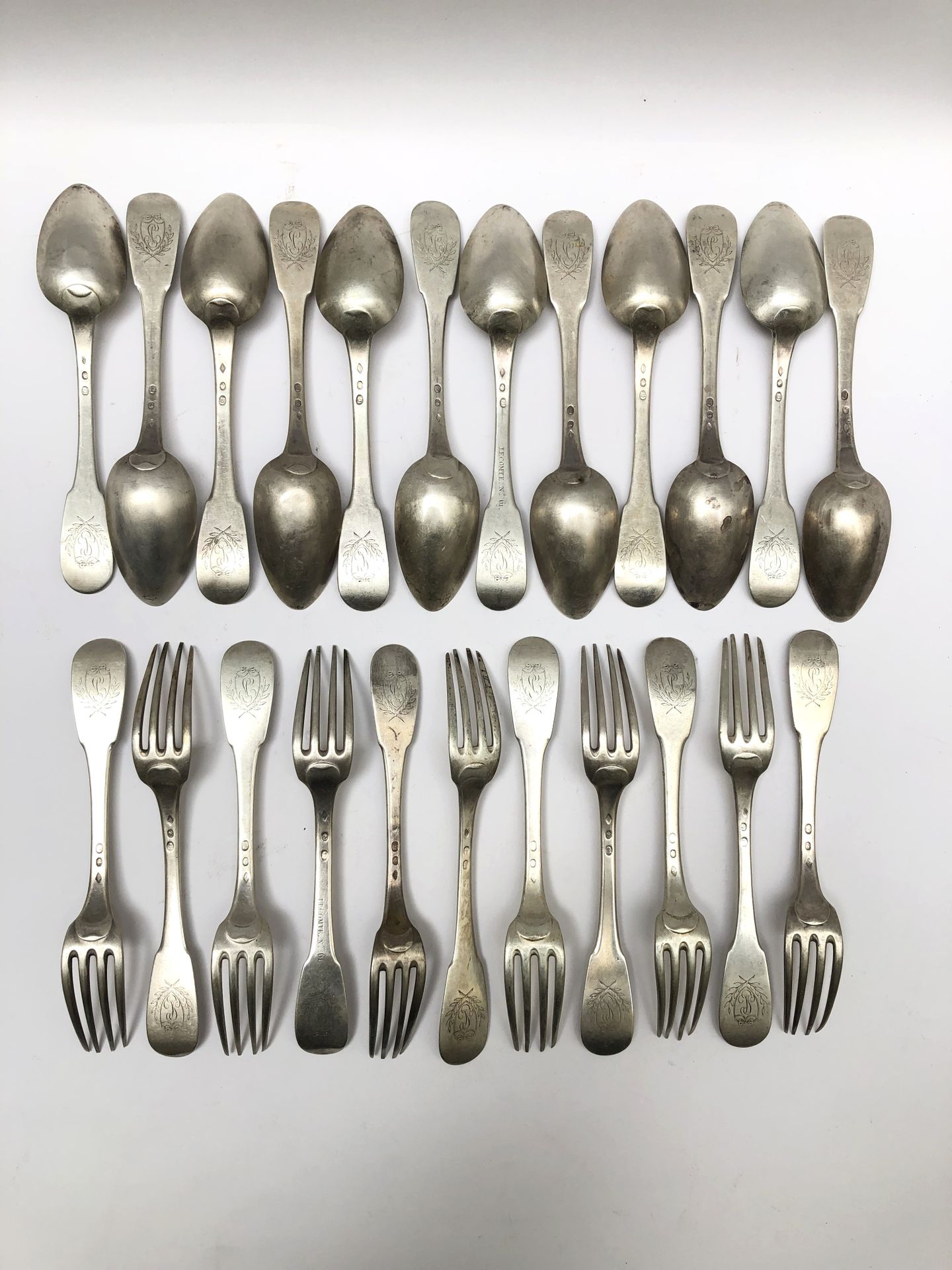 Null Silver lot including: eleven large cutlery and a large spoon, uniplat model&hellip;