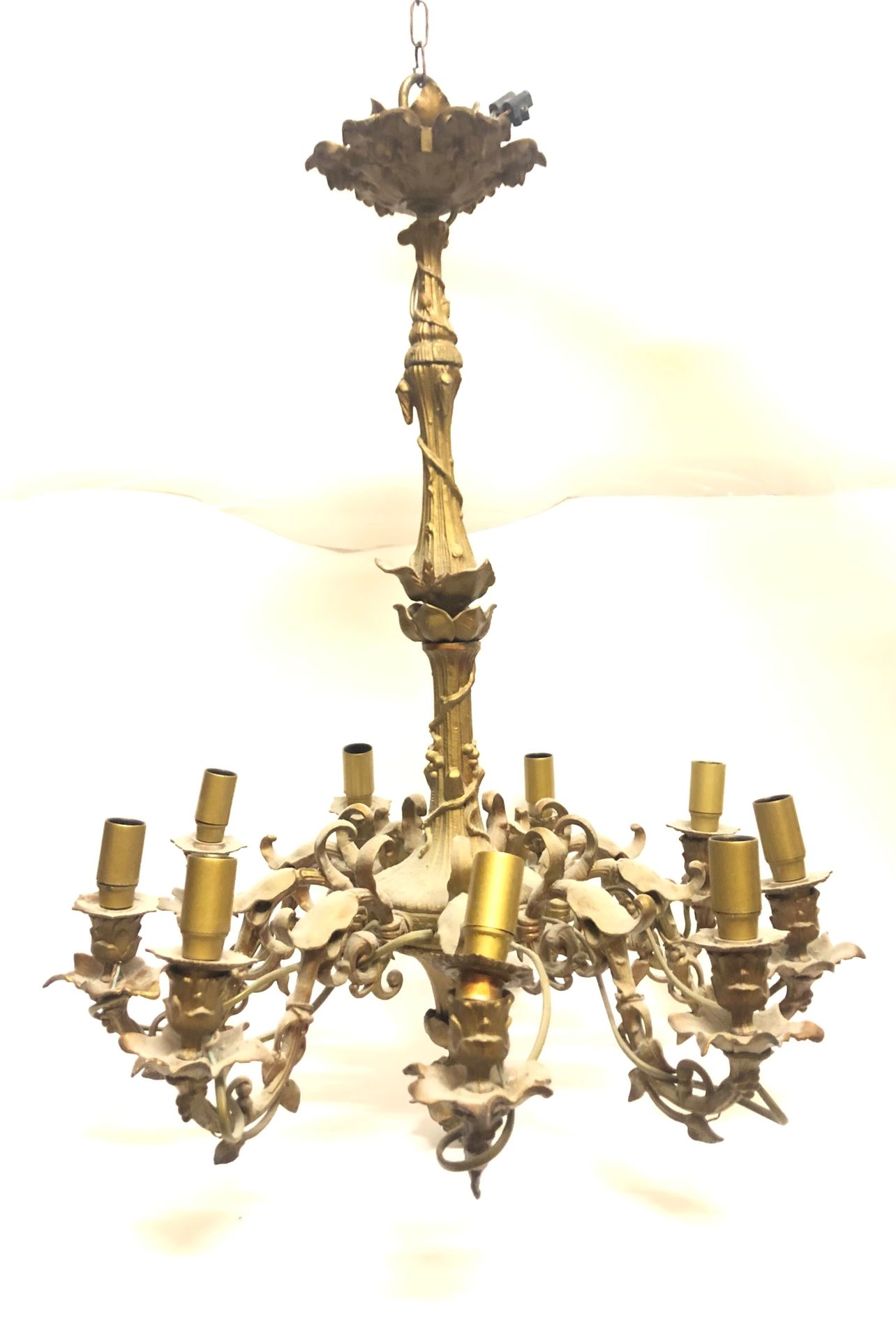 Null lot : 
Gilded metal chandelier decorated with leaves and vines. Height. Hei&hellip;