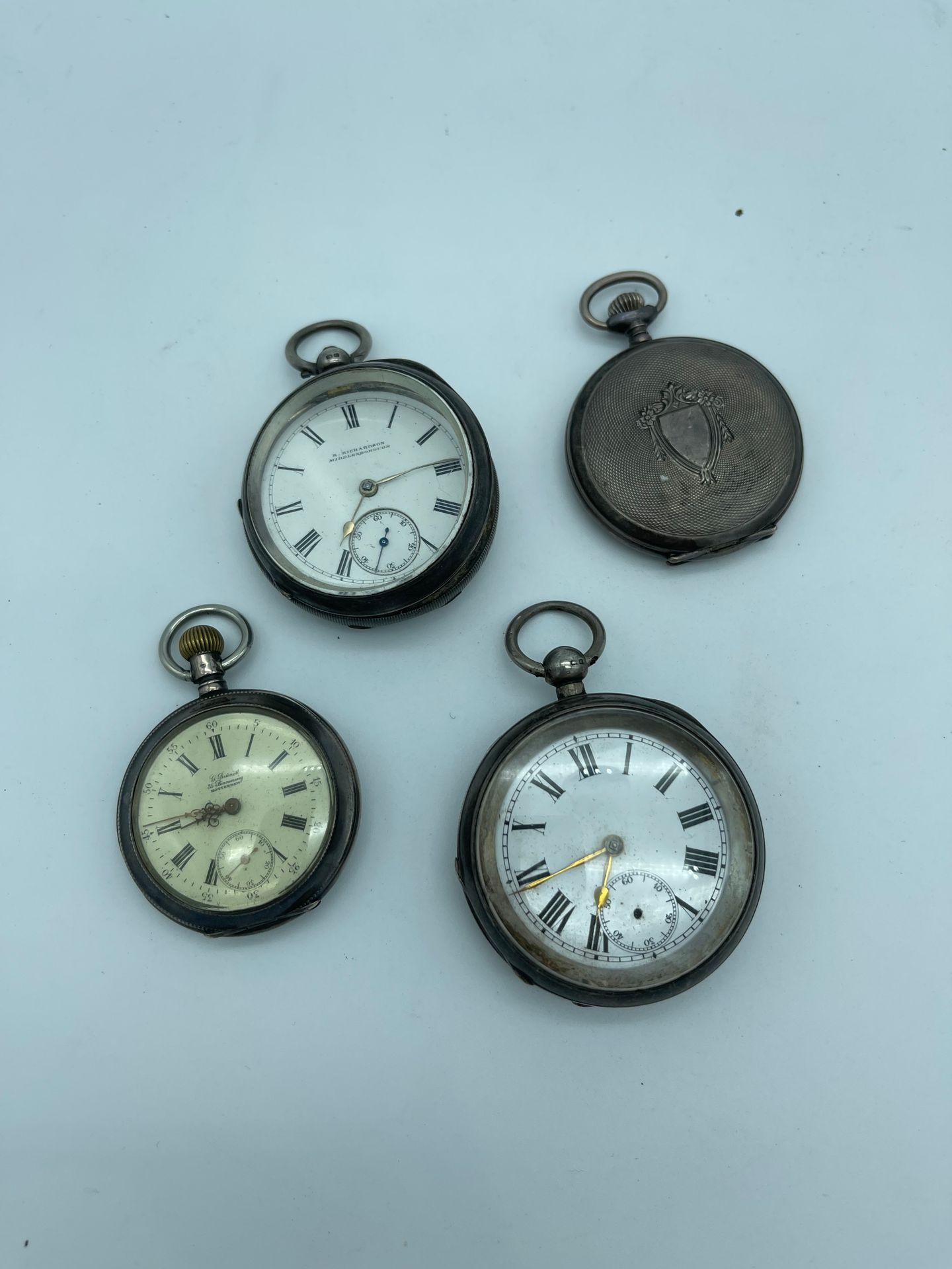 Null Lot of four metal and silver pocket watches?