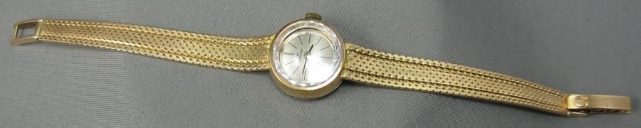 OMEGA Montre bracelet de Dame en or, bracelet ruban en chute, cadran rond doré, &hellip;