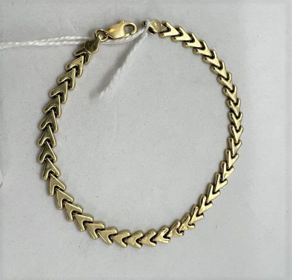 Null Armband aus Gold (14 Karat); Stempel Jakobsmuschel, Epis-Masche.

Gewicht: &hellip;
