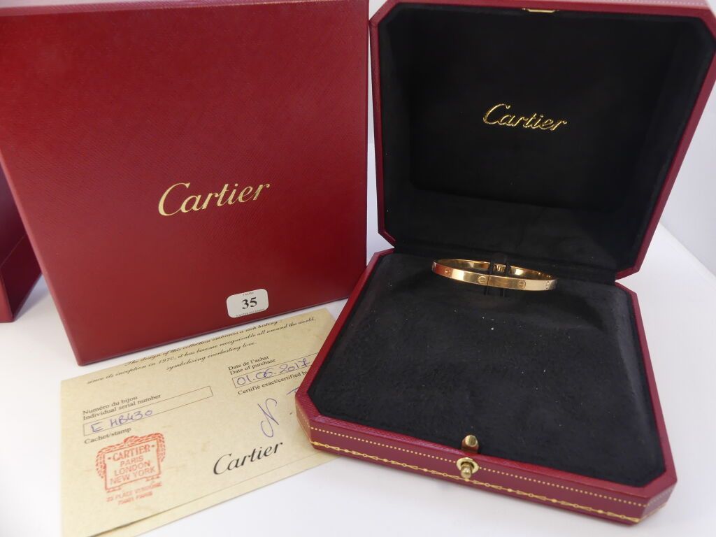 Null CARTIER. Bracelet model "Love" in gold 750°/°°, decorated with "screw" moti&hellip;