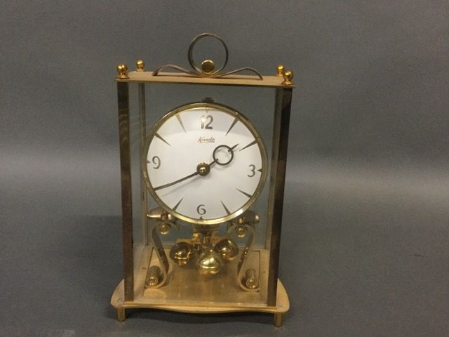 Null KUNDO Perpetual Motion Clock, vergoldet