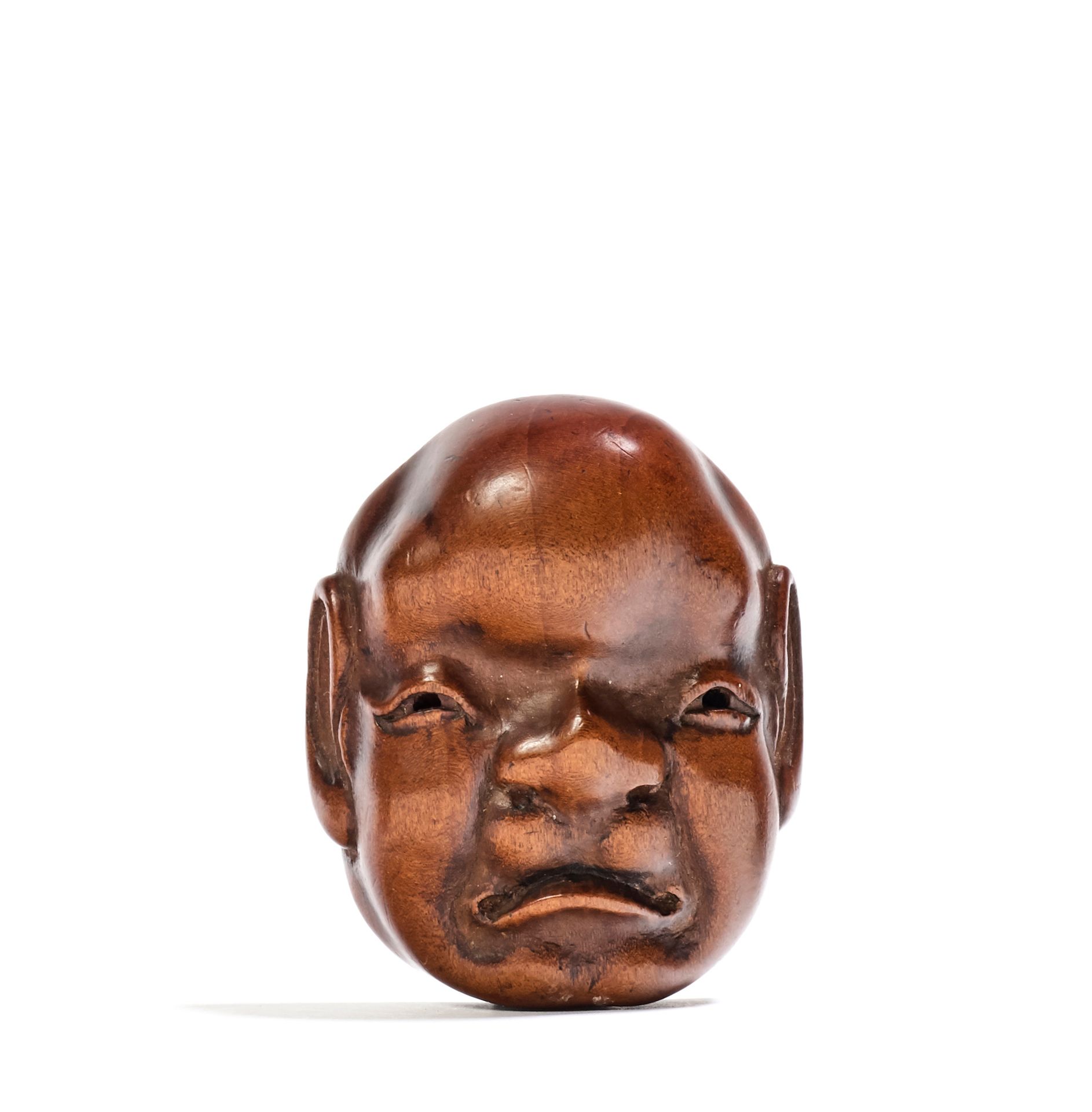 JAPON - XIXE SIÈCLE Netsuke in legno di bosso, maschera Kyogen, figura con smorf&hellip;