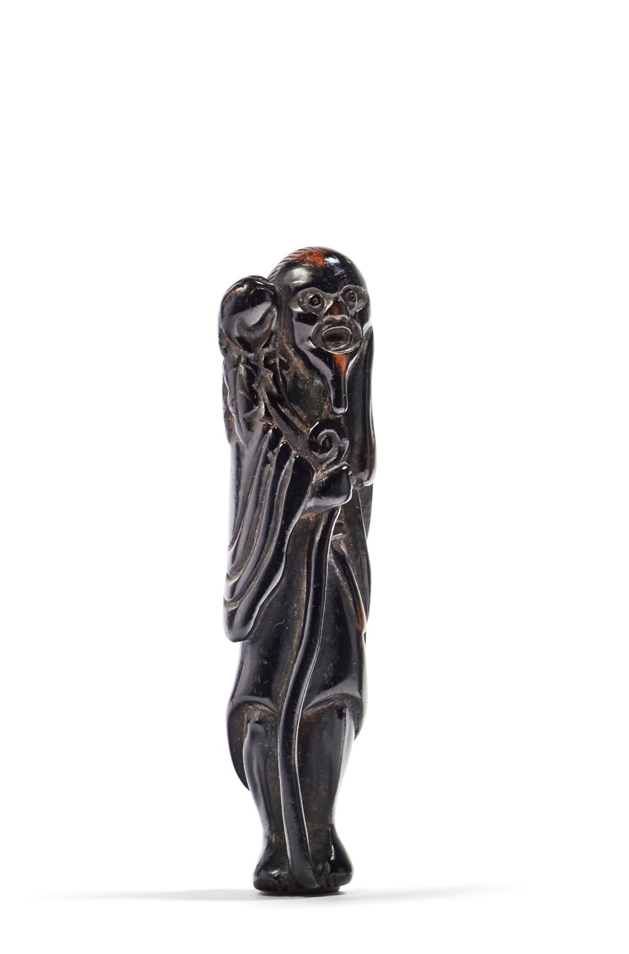 JAPON - XIXE SIÈCLE Wooden netsuke, Gama
Sennin standing holding a stick in his &hellip;