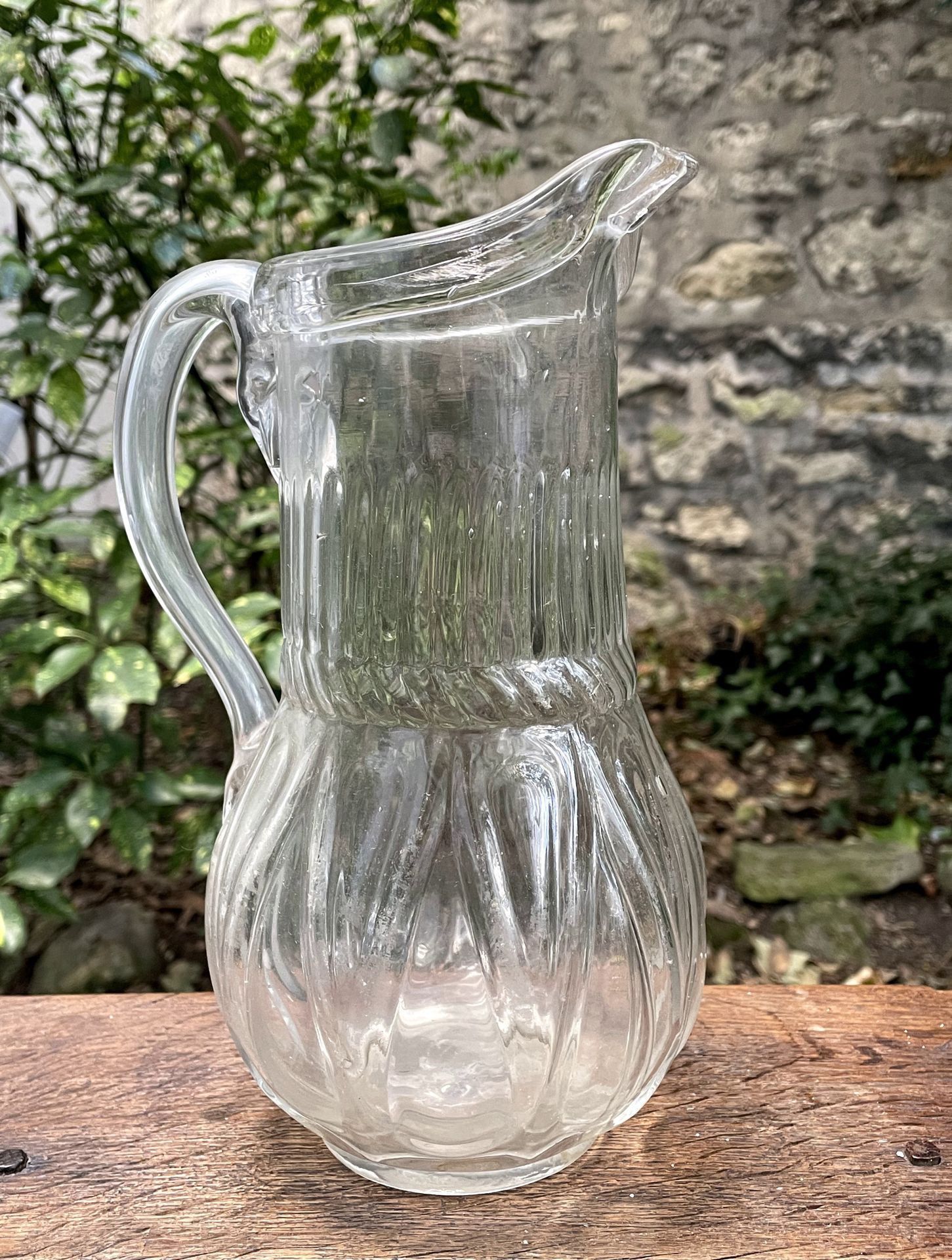 Null 
Colorless molded glass pitcher



Normandy, early 19th century 



H. 23,2&hellip;