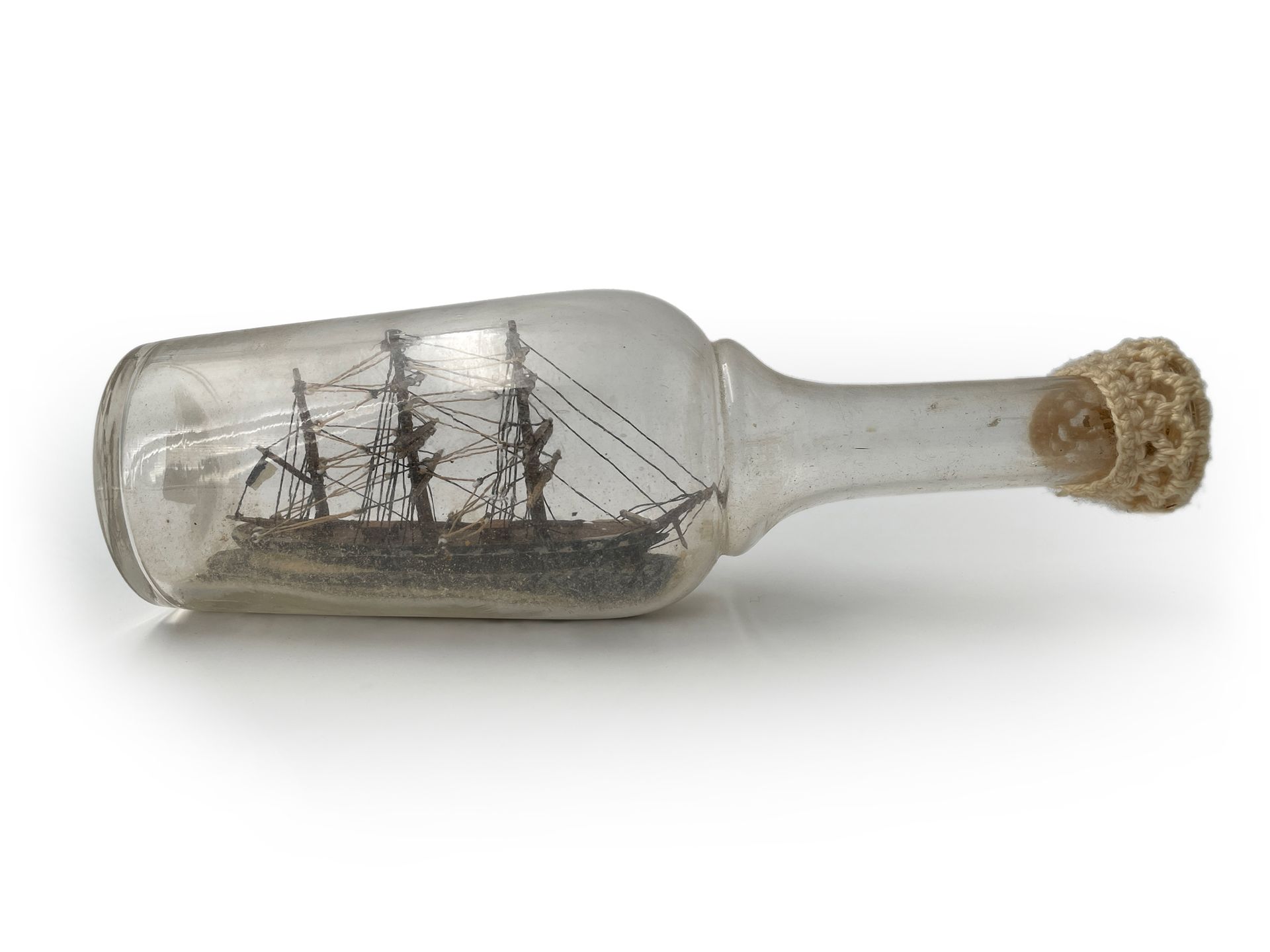 Null Three-masted boat in a bottle