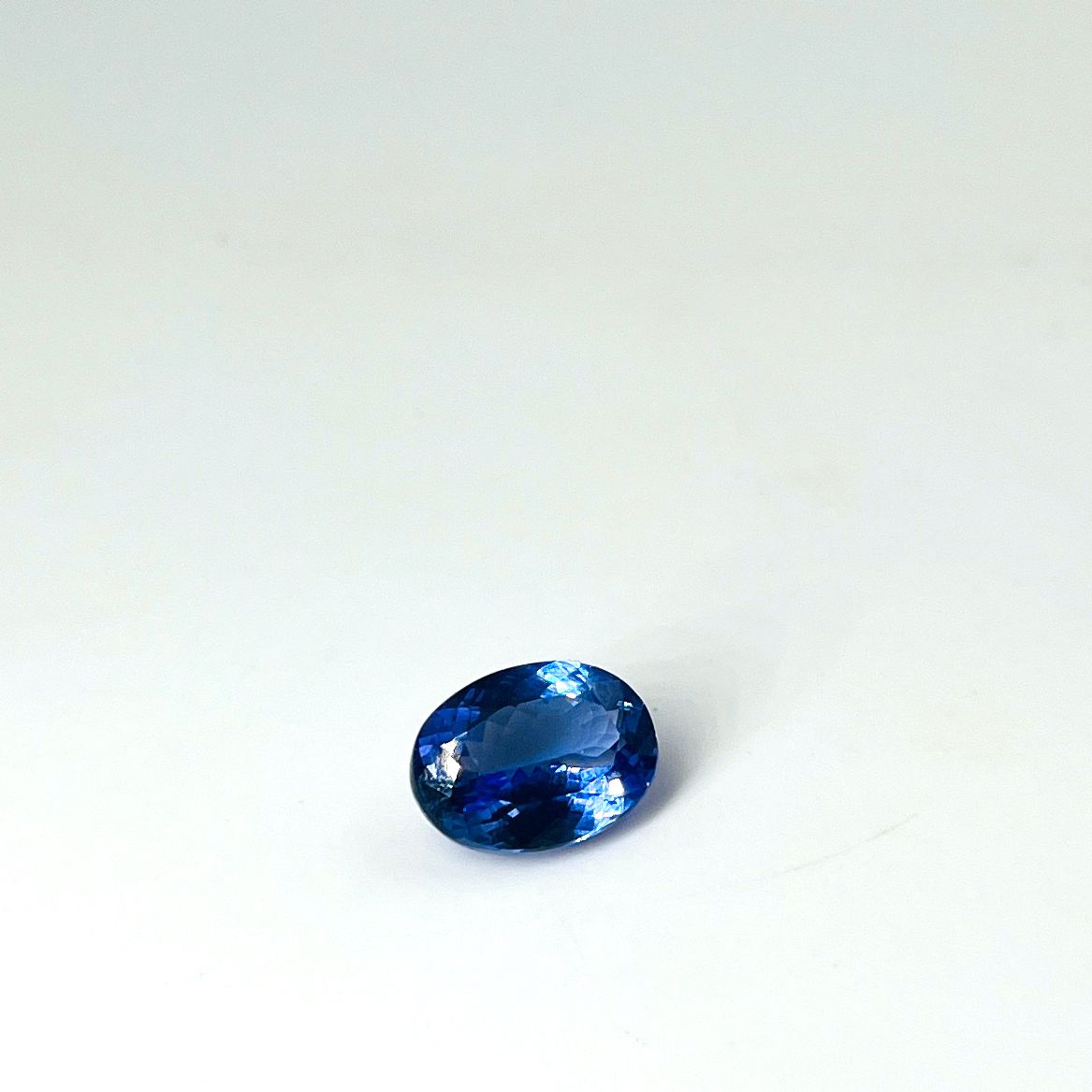 Null Oval Tanzanite weighing 7.05 cts. Accompanied by an AIG certificate.