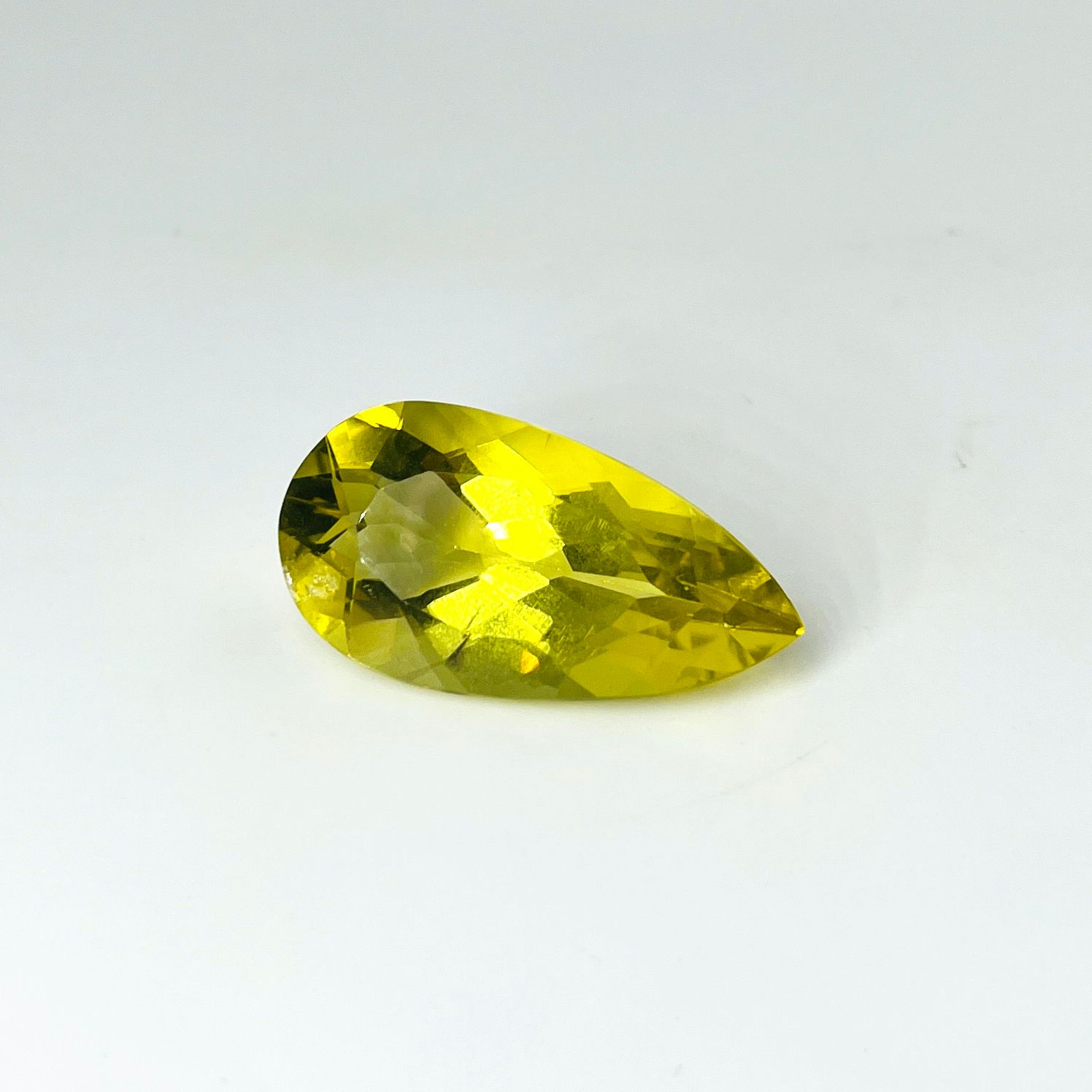 Null Pear cut lemon quartz weighing 38.09 cts.