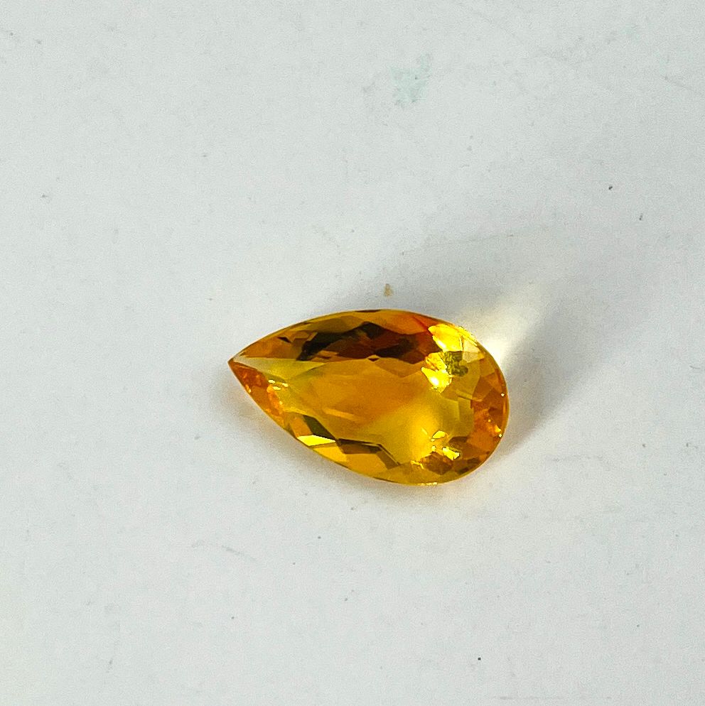 Null Pear cut fire opal weighing 5.84 cts probably from Mexico.Dimensions: 1.8 x&hellip;