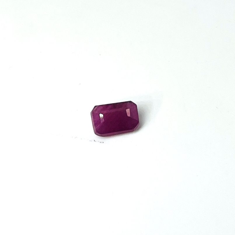Null Rectangular cut ruby weighing 2.27 cts. With its IGI certificate.