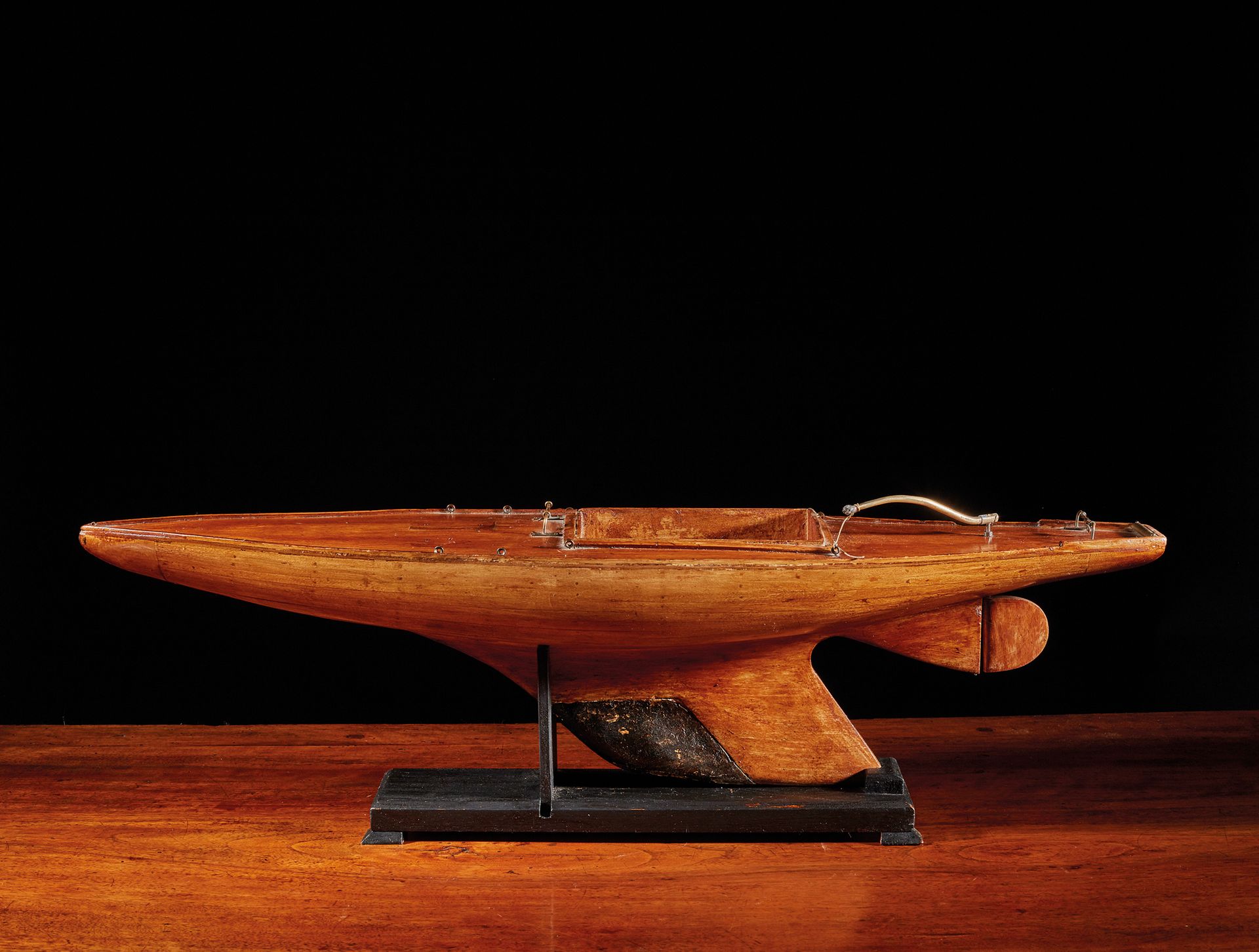 Null Model of a yacht, hull planked in light wood, varnished deck, brass tiller,&hellip;