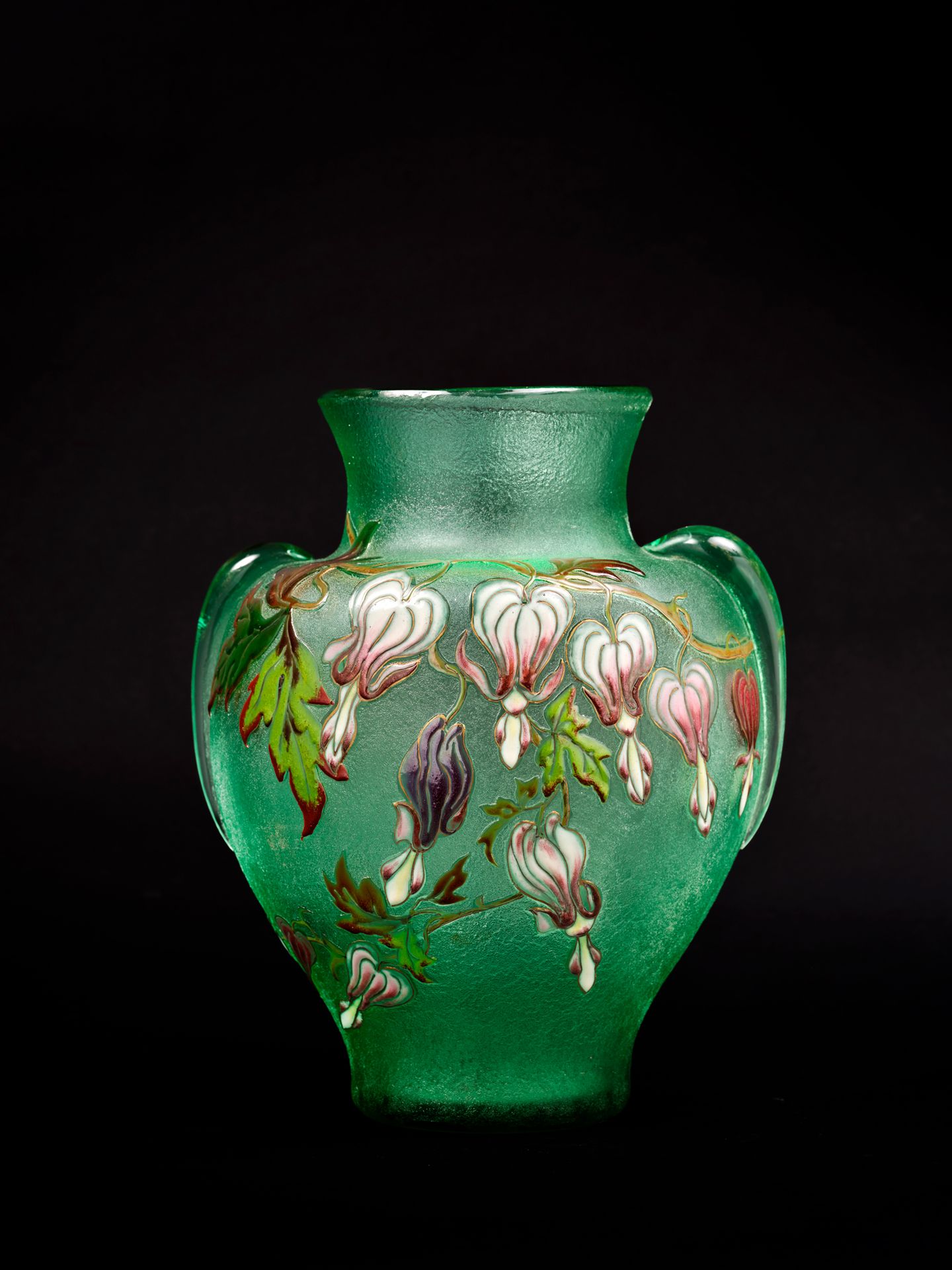 Emile GALLE (1846-1904) Vase galbé à anses en verre givré vert émaillé à décor d&hellip;