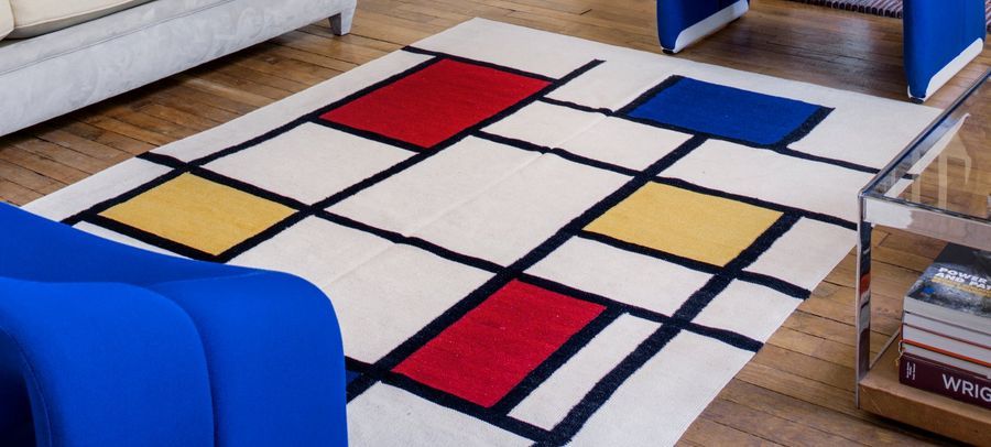 TRAVAIL MODERNE Tapis en laine rase à motif d'après Piet Mondrian
244 x 163 cm