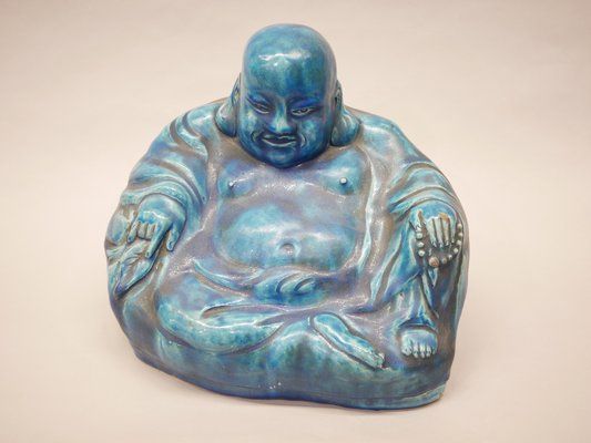 Null Bouddha en plâtre peint, XXe siècle
(petits accidents)
haut : 22 cm