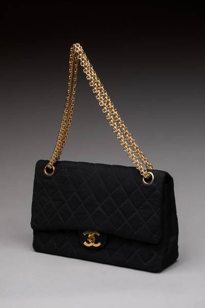 CHANEL - Classic Timeless bag in black quilted wool Jers…