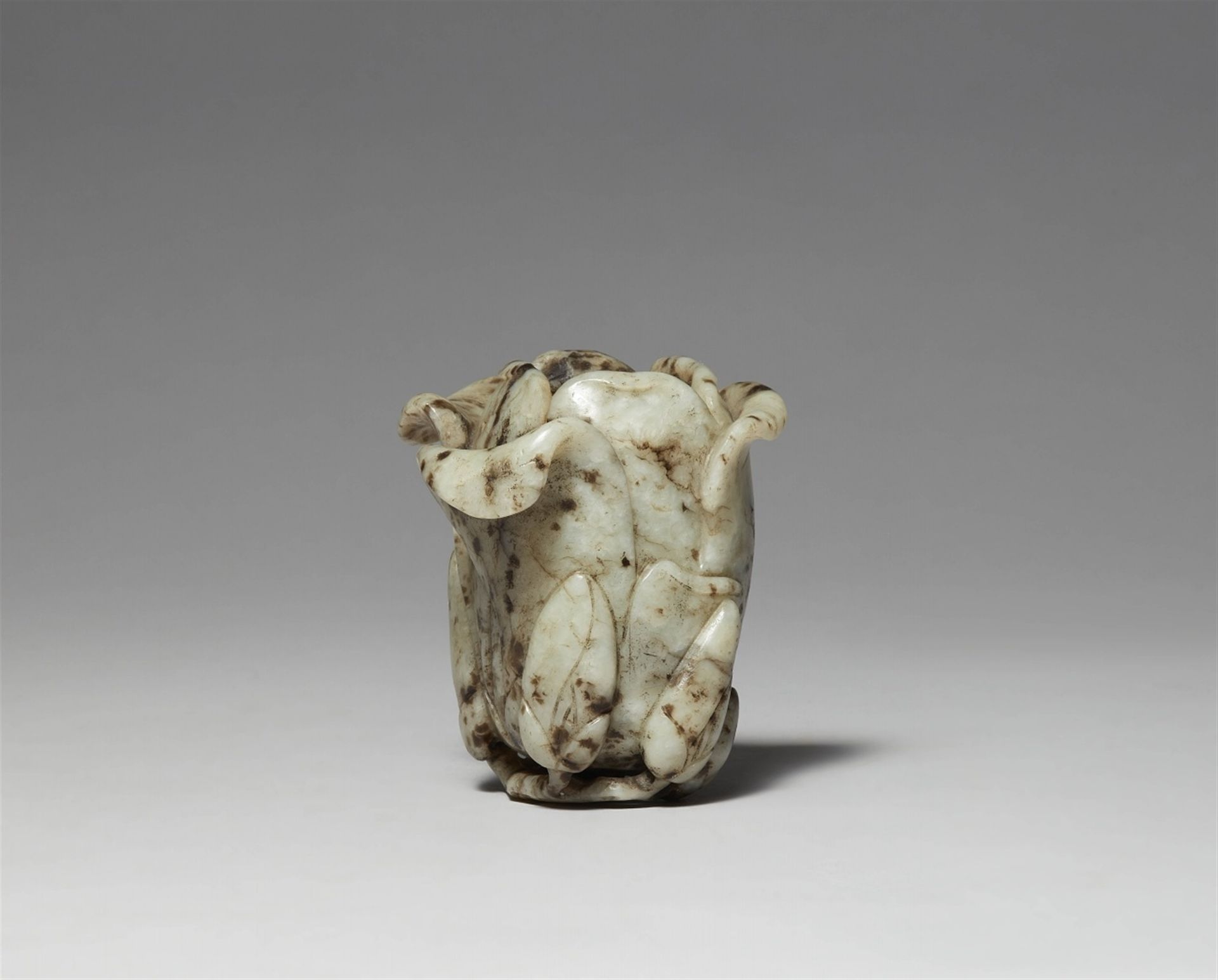 Null A pale grey jade magnolia bush washer. Qing dynasty



Carved in the form o&hellip;