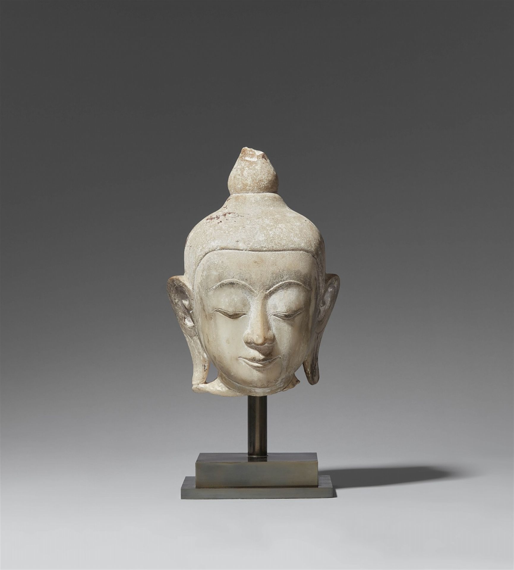 Null A Shan alabaster head of a Buddha. Burma. 19th/20th century



The eyes low&hellip;