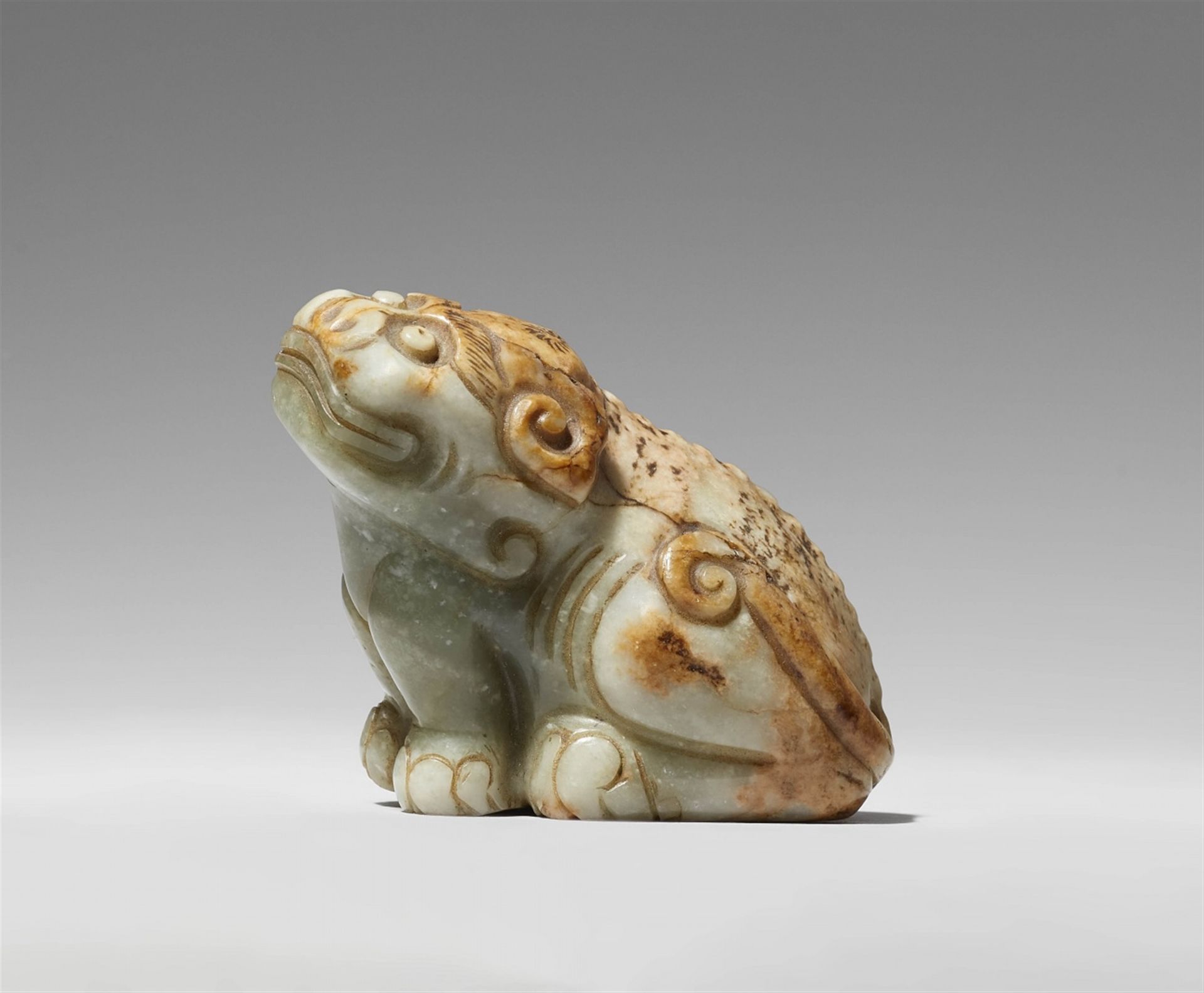 Null A celadon and russet jade carving of a mythical beast. 18th/19th century


&hellip;