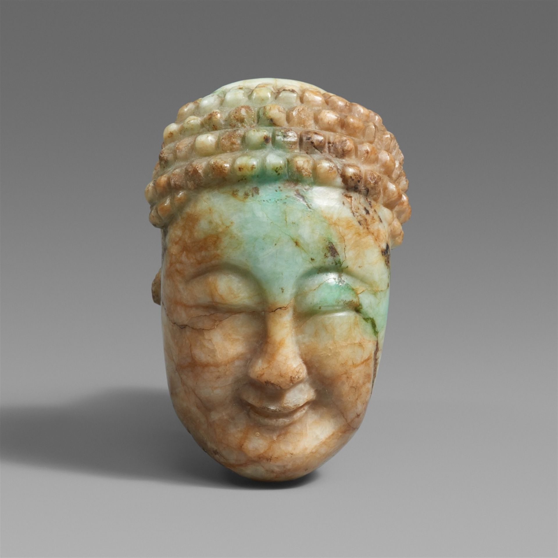 Null A mottle jade head of a smiling Buddha.



The longish face with curved eye&hellip;