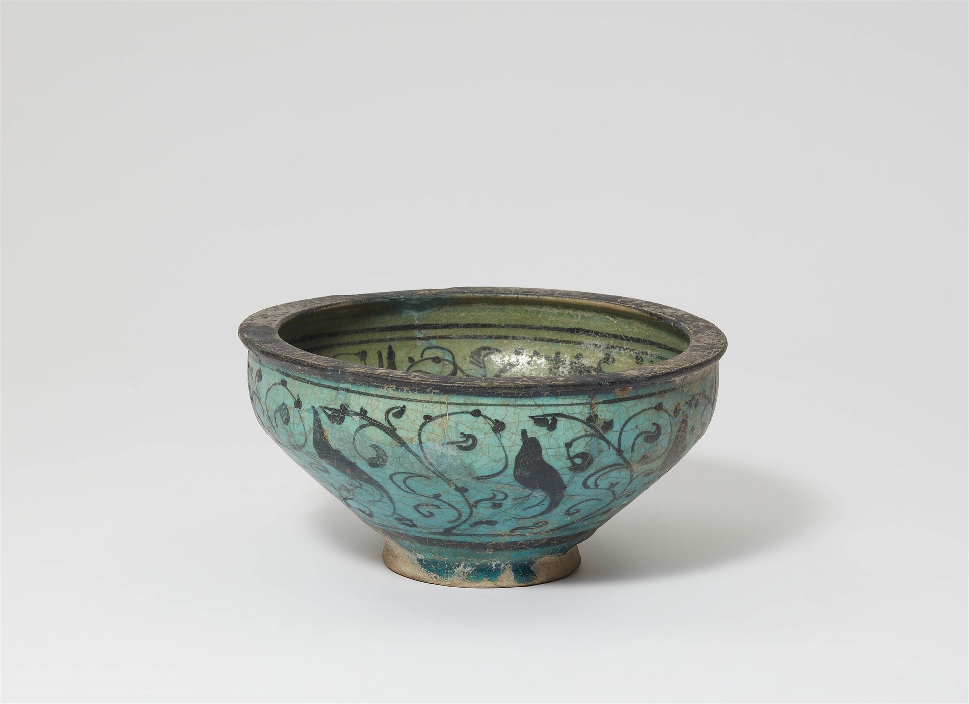 Null An Iranian fritware dish with a Cypress motif





With turquoise glaze and&hellip;