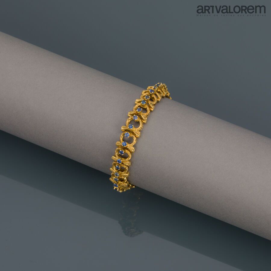 Null Bracelet en or jaune 750°/°° à maillons articulés circulaires et ciselées o&hellip;