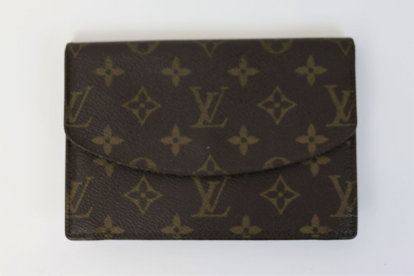 LOUIS VUITTON Small paper holder in monogram canvas, br…