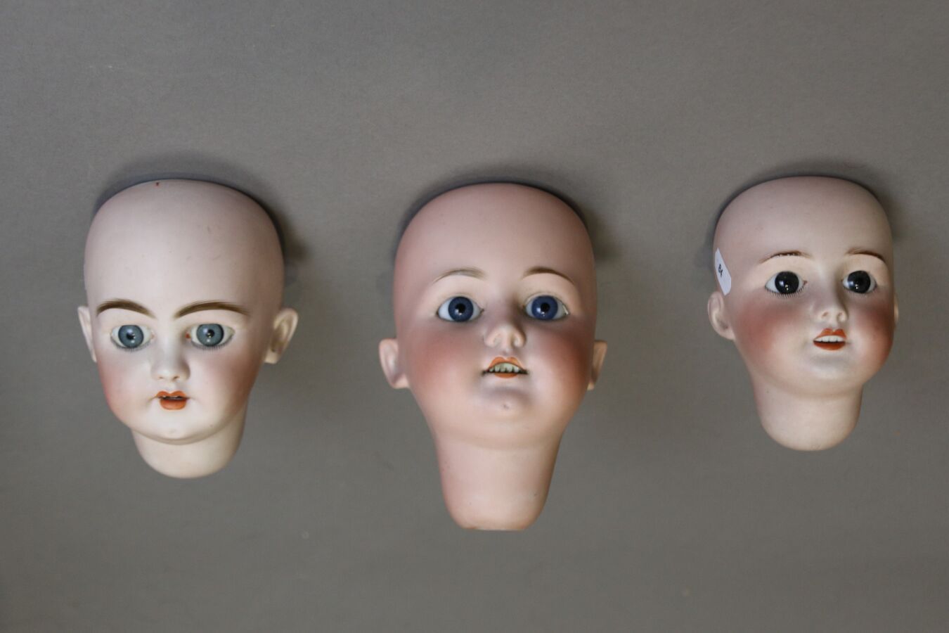 Null Three German doll heads, in bisque, marked "GERMANY 7" blue refixed eyes, H&hellip;