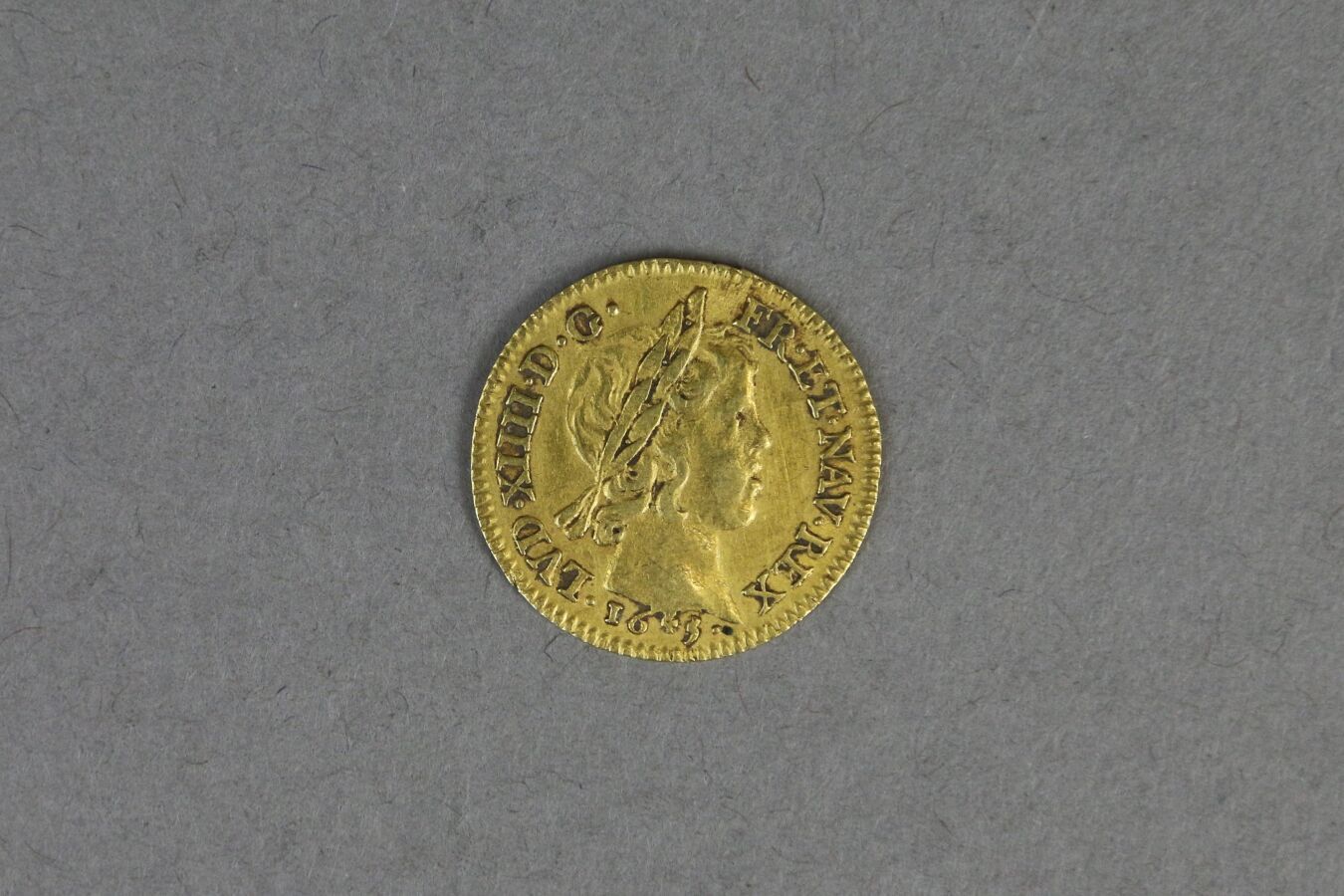 Null 法国

半个路易十四的黄金头像，1653年