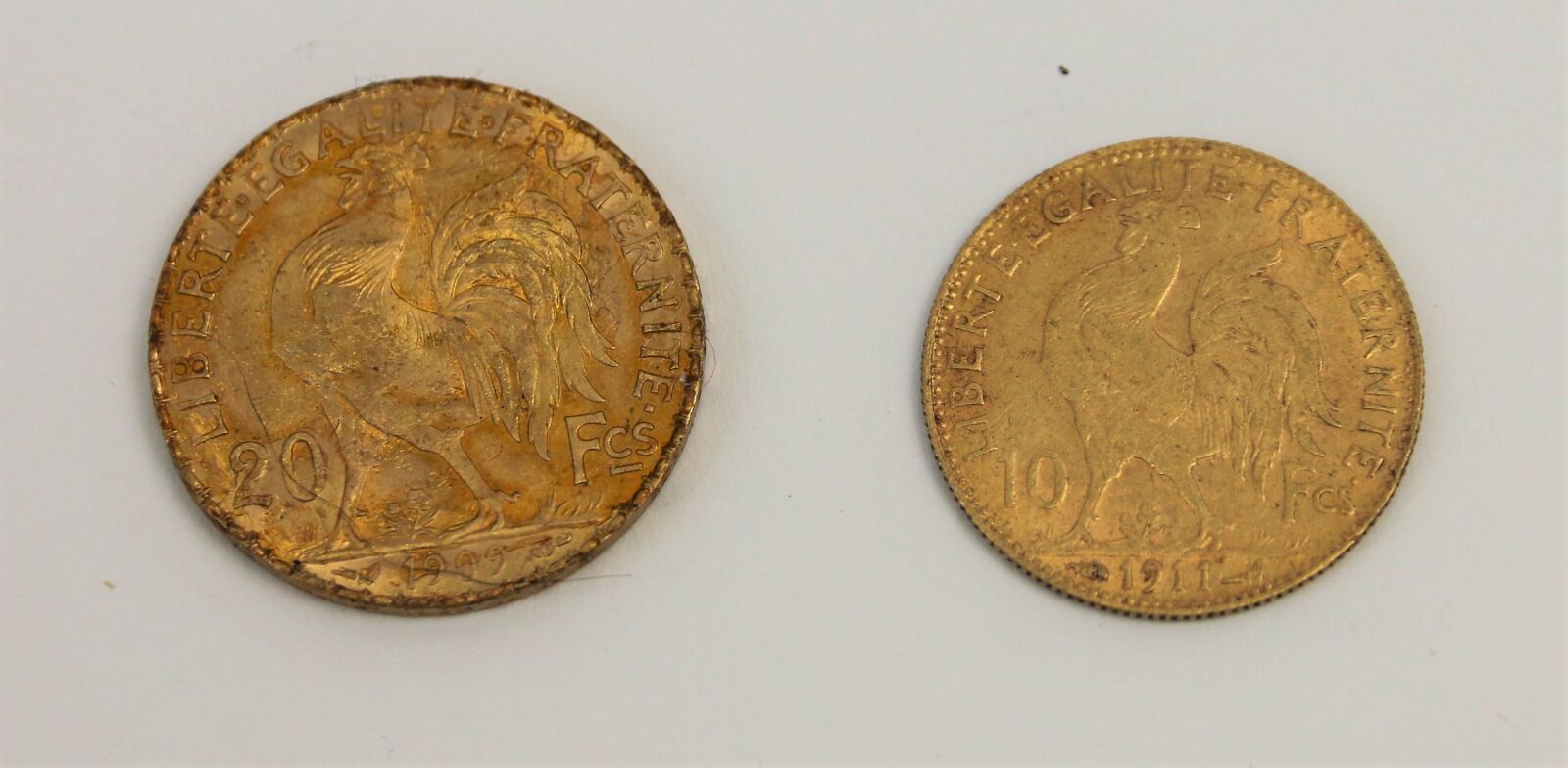 Null FRANCIA 

20 francos de oro con gallo (1909) y 10 francos con gallo (1911)
