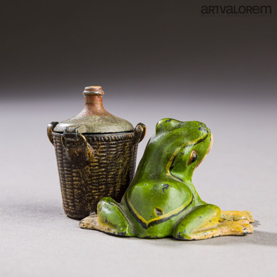 Null Polychromed lead inkwell featuring a frog flanked by a basket containing a &hellip;