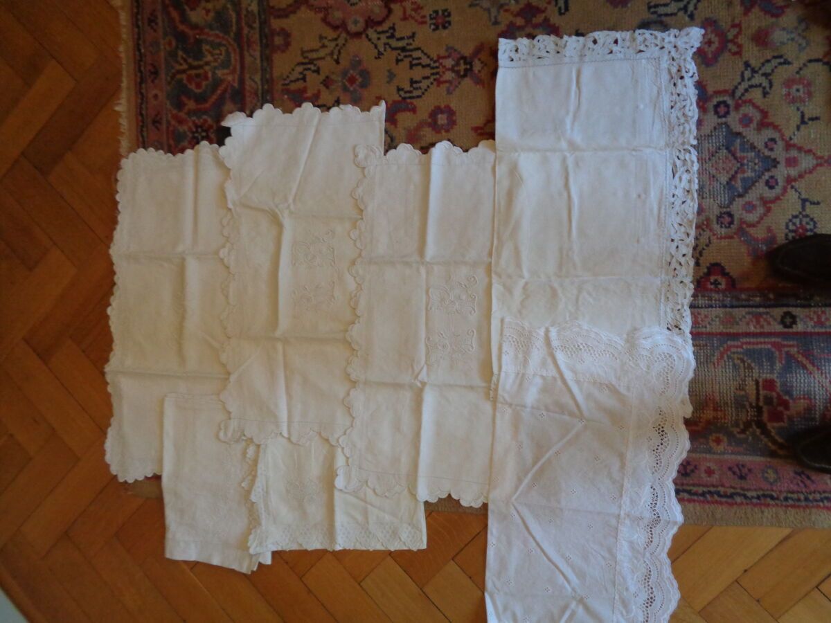 Null Reunion of seven embroidered pillowcases, including a pair embroidered AR.