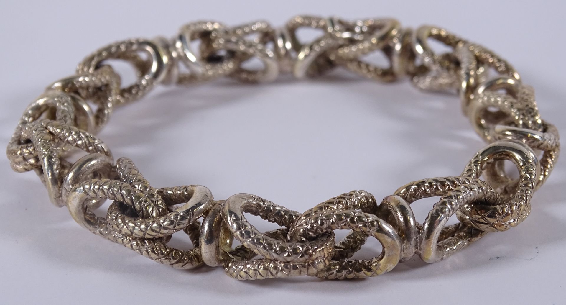 HERMES Bracelet en argent, maille 3D.

Longueur : 23 cm.

Poids : 58,88 gr.