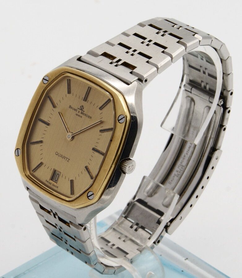 Null Baume & Mercier腕表。18K黄金和钢。约1990年。石英机芯。金色表盘，6点钟位置有日期。棍子的手。印刷的数字。应用小时标记。金色的螺旋&hellip;