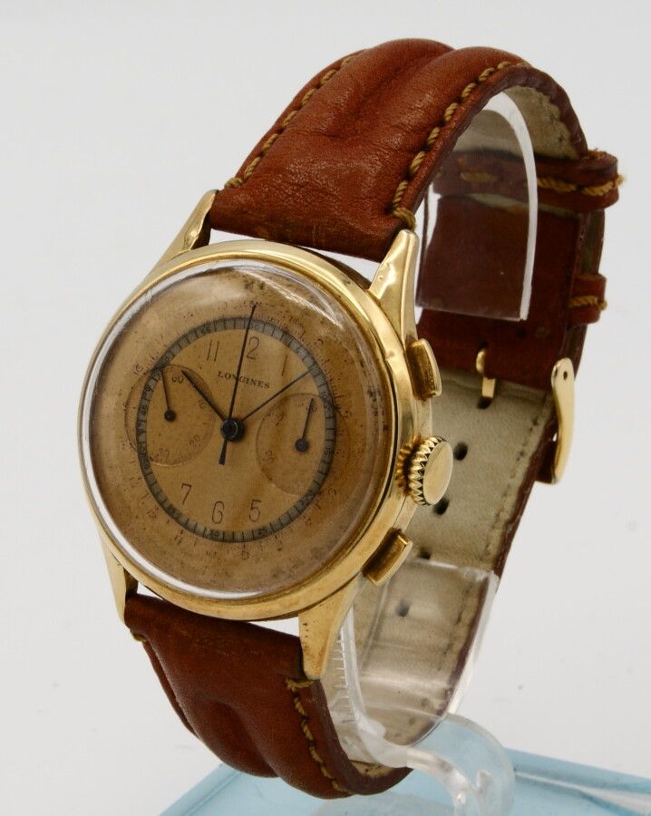 Null Montre bracelet chronographe Longines en or 18K. Vers 1940. Mouvement à rem&hellip;