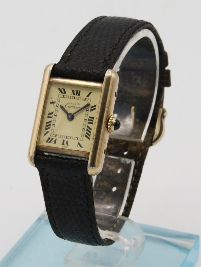Null Montre bracelet dame Cartier Tank Must. Vers 1980. Mouvement mécanique à re&hellip;