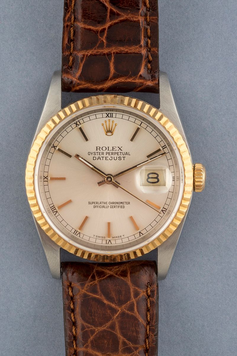 Null ROLEX。金色和钢制的男士手表，日期为Just型号。Ref.16233，n°L733981。皮带，带针扣。1989年。自动机芯。表壳36毫米。