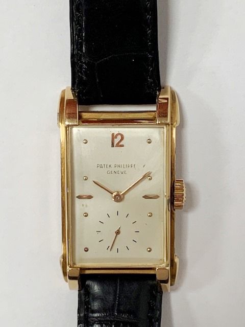 Null PATEK Philippe.黄金长方形手表。Ref.2417 J. Buckle手镯。1940s.机械机芯。毛重36.99克。