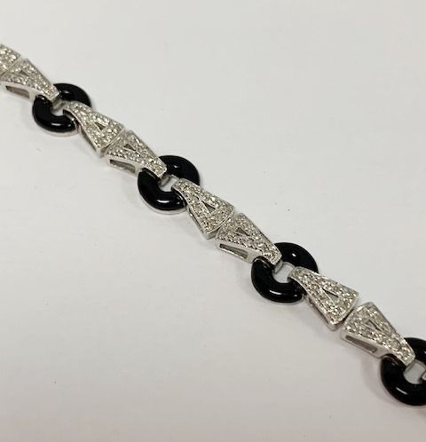 Null Bracelet style Art Déco en or blanc 18K 750°, diamants et onyx. Poids brut &hellip;