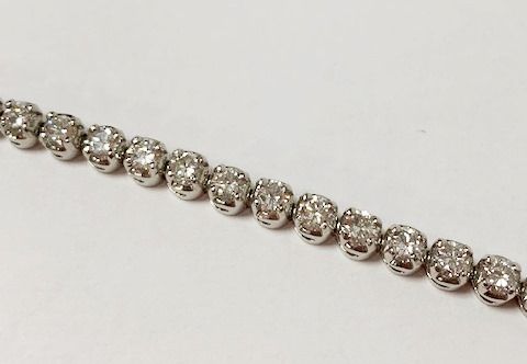 Null White gold line bracelet set with 37 diamonds for a total weight of about 6&hellip;